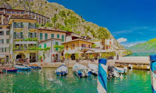 Some small boats docked in a harbour, Italy